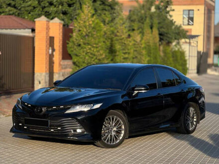 Черный Тойота Камри, объемом двигателя 2.49 л и пробегом 155 тыс. км за 25500 $, фото 1 на Automoto.ua