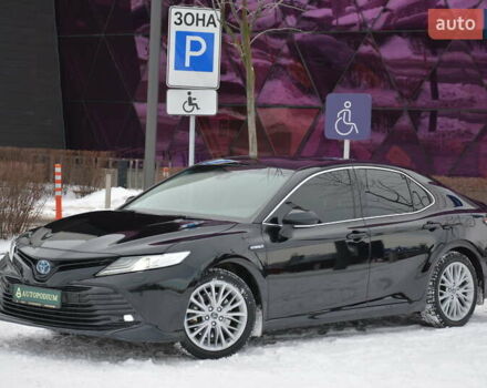 Черный Тойота Камри, объемом двигателя 2.49 л и пробегом 186 тыс. км за 26000 $, фото 1 на Automoto.ua