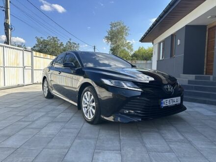 Черный Тойота Камри, объемом двигателя 2.5 л и пробегом 140 тыс. км за 20600 $, фото 1 на Automoto.ua