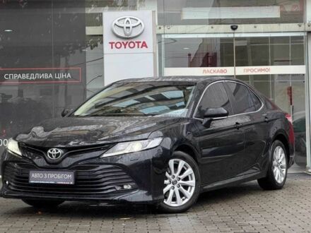 Черный Тойота Камри, объемом двигателя 2.5 л и пробегом 120 тыс. км за 22191 $, фото 1 на Automoto.ua