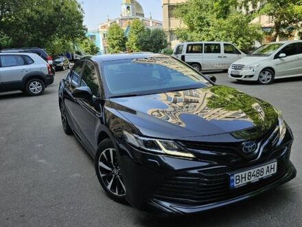 Черный Тойота Камри, объемом двигателя 2.5 л и пробегом 104 тыс. км за 25400 $, фото 1 на Automoto.ua