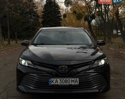 Чорний Тойота Камрі, об'ємом двигуна 2.49 л та пробігом 64 тис. км за 24000 $, фото 1 на Automoto.ua