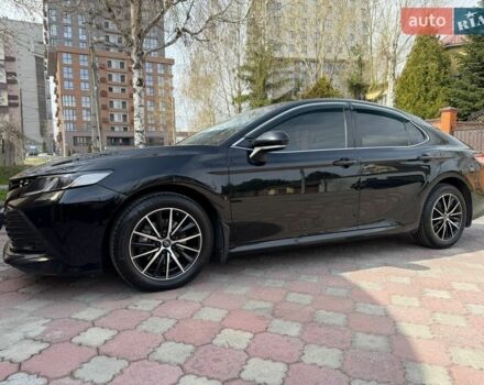 Черный Тойота Камри, объемом двигателя 2.49 л и пробегом 105 тыс. км за 21700 $, фото 1 на Automoto.ua