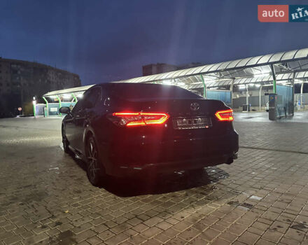 Чорний Тойота Камрі, об'ємом двигуна 2.49 л та пробігом 82 тис. км за 29000 $, фото 1 на Automoto.ua