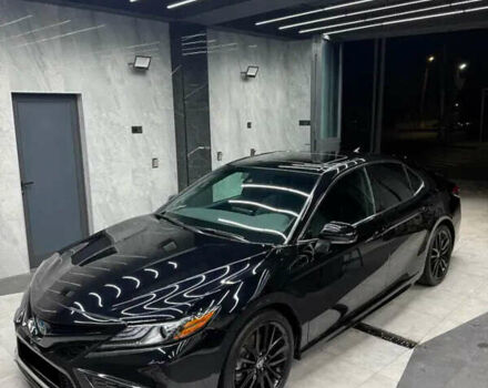 Чорний Тойота Камрі, об'ємом двигуна 2.49 л та пробігом 100 тис. км за 25000 $, фото 1 на Automoto.ua