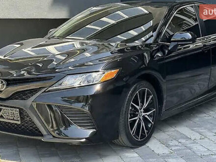 Чорний Тойота Камрі, об'ємом двигуна 2.49 л та пробігом 87 тис. км за 23000 $, фото 1 на Automoto.ua