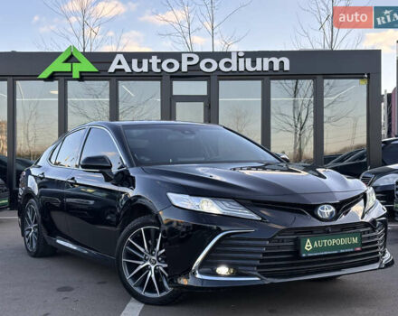 Черный Тойота Камри, объемом двигателя 2.49 л и пробегом 131 тыс. км за 32000 $, фото 1 на Automoto.ua