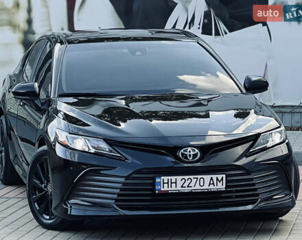 Черный Тойота Камри, объемом двигателя 2.49 л и пробегом 57 тыс. км за 22700 $, фото 1 на Automoto.ua