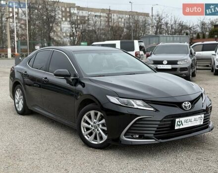 Черный Тойота Камри, объемом двигателя 2.49 л и пробегом 99 тыс. км за 27500 $, фото 1 на Automoto.ua
