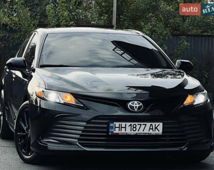 Черный Тойота Камри, объемом двигателя 2.5 л и пробегом 57 тыс. км за 23700 $, фото 1 на Automoto.ua