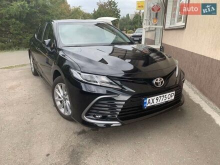 Чорний Тойота Камрі, об'ємом двигуна 2.49 л та пробігом 23 тис. км за 28200 $, фото 1 на Automoto.ua
