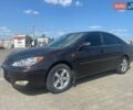 Коричневий Тойота Камрі, об'ємом двигуна 2.4 л та пробігом 320 тис. км за 4700 $, фото 1 на Automoto.ua