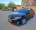 Коричневий Тойота Камрі, об'ємом двигуна 2.5 л та пробігом 243 тис. км за 12600 $, фото 1 на Automoto.ua