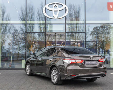 Коричневый Тойота Камри, объемом двигателя 2.49 л и пробегом 143 тыс. км за 21906 $, фото 1 на Automoto.ua