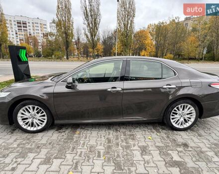 Коричневый Тойота Камри, объемом двигателя 2.49 л и пробегом 104 тыс. км за 23000 $, фото 2 на Automoto.ua