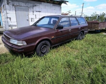 Коричневий Тойота Камрі, об'ємом двигуна 2 л та пробігом 435 тис. км за 744 $, фото 1 на Automoto.ua