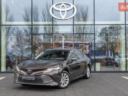 Коричневый Тойота Камри, объемом двигателя 2.49 л и пробегом 143 тыс. км за 21906 $, фото 1 на Automoto.ua