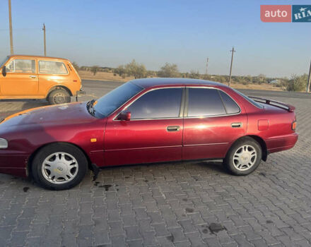 Червоний Тойота Камрі, об'ємом двигуна 2.96 л та пробігом 421 тис. км за 1200 $, фото 3 на Automoto.ua