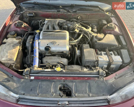 Червоний Тойота Камрі, об'ємом двигуна 2.96 л та пробігом 421 тис. км за 1200 $, фото 9 на Automoto.ua