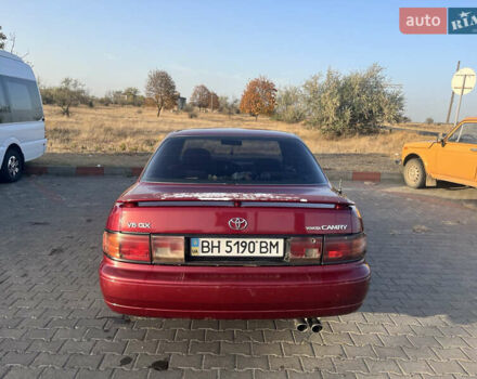 Червоний Тойота Камрі, об'ємом двигуна 2.96 л та пробігом 421 тис. км за 1200 $, фото 6 на Automoto.ua