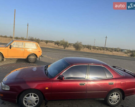 Червоний Тойота Камрі, об'ємом двигуна 2.96 л та пробігом 421 тис. км за 1200 $, фото 4 на Automoto.ua