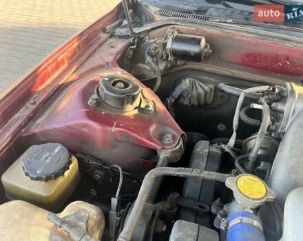 Червоний Тойота Камрі, об'ємом двигуна 2.96 л та пробігом 421 тис. км за 1200 $, фото 10 на Automoto.ua