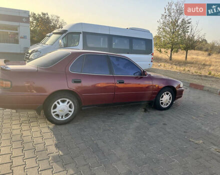 Червоний Тойота Камрі, об'ємом двигуна 2.96 л та пробігом 421 тис. км за 1200 $, фото 2 на Automoto.ua