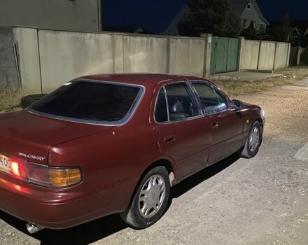 Червоний Тойота Камрі, об'ємом двигуна 3 л та пробігом 230 тис. км за 1450 $, фото 1 на Automoto.ua