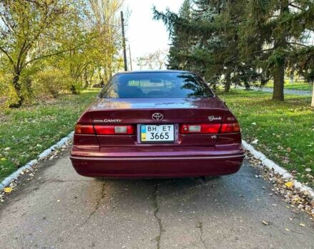 Красный Тойота Камри, объемом двигателя 3 л и пробегом 340 тыс. км за 2950 $, фото 4 на Automoto.ua