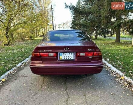 Червоний Тойота Камрі, об'ємом двигуна 3 л та пробігом 340 тис. км за 2950 $, фото 4 на Automoto.ua