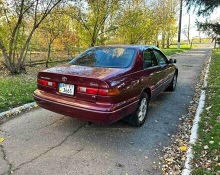 Красный Тойота Камри, объемом двигателя 3 л и пробегом 340 тыс. км за 2950 $, фото 3 на Automoto.ua
