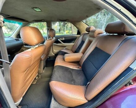 Красный Тойота Камри, объемом двигателя 3 л и пробегом 340 тыс. км за 2950 $, фото 7 на Automoto.ua