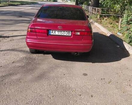 Красный Тойота Камри, объемом двигателя 2.16 л и пробегом 202 тыс. км за 5000 $, фото 20 на Automoto.ua