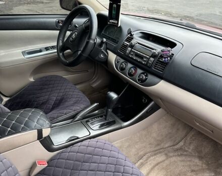 Красный Тойота Камри, объемом двигателя 2.4 л и пробегом 246 тыс. км за 4100 $, фото 17 на Automoto.ua