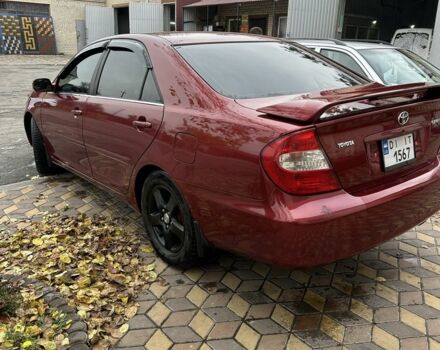 Красный Тойота Камри, объемом двигателя 2.4 л и пробегом 246 тыс. км за 4100 $, фото 10 на Automoto.ua