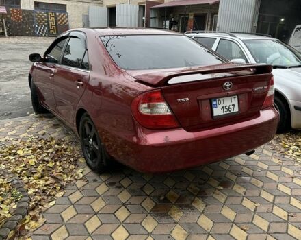 Красный Тойота Камри, объемом двигателя 2.4 л и пробегом 246 тыс. км за 4100 $, фото 8 на Automoto.ua