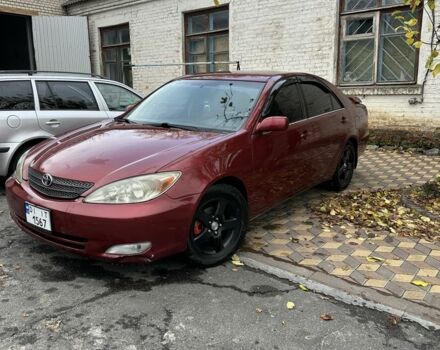 Красный Тойота Камри, объемом двигателя 2.4 л и пробегом 246 тыс. км за 4100 $, фото 5 на Automoto.ua