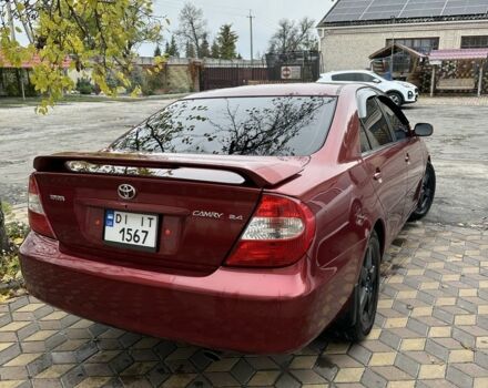 Красный Тойота Камри, объемом двигателя 2.4 л и пробегом 246 тыс. км за 4100 $, фото 13 на Automoto.ua