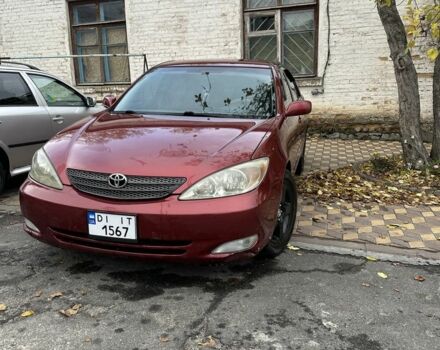 Красный Тойота Камри, объемом двигателя 2.4 л и пробегом 246 тыс. км за 4100 $, фото 2 на Automoto.ua
