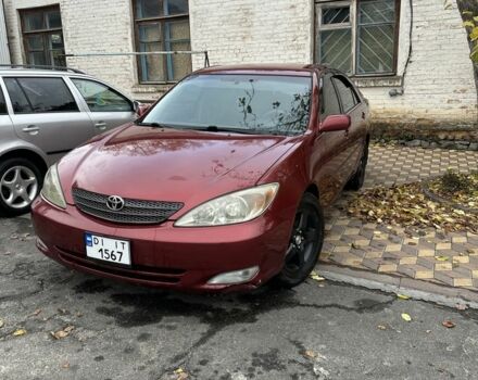 Красный Тойота Камри, объемом двигателя 2.4 л и пробегом 246 тыс. км за 4100 $, фото 1 на Automoto.ua