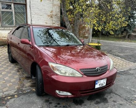 Красный Тойота Камри, объемом двигателя 2.4 л и пробегом 246 тыс. км за 4100 $, фото 3 на Automoto.ua