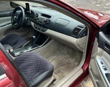 Красный Тойота Камри, объемом двигателя 2.4 л и пробегом 246 тыс. км за 4100 $, фото 16 на Automoto.ua