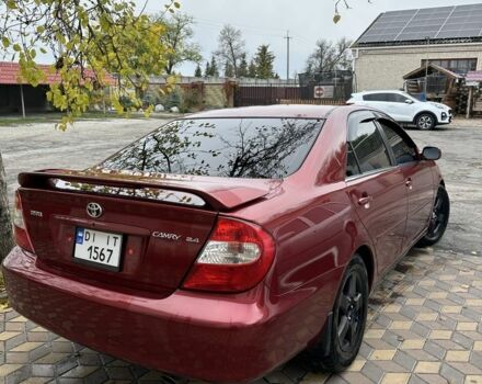 Красный Тойота Камри, объемом двигателя 2.4 л и пробегом 246 тыс. км за 4100 $, фото 12 на Automoto.ua