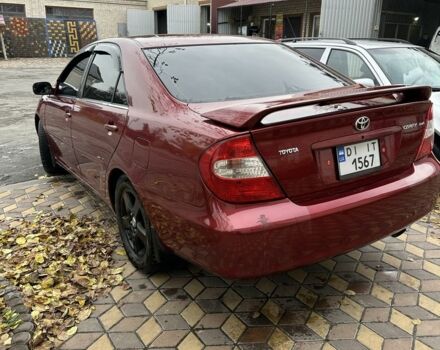 Красный Тойота Камри, объемом двигателя 2.4 л и пробегом 246 тыс. км за 4100 $, фото 9 на Automoto.ua