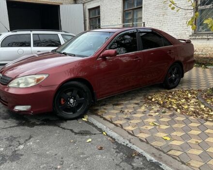 Красный Тойота Камри, объемом двигателя 2.4 л и пробегом 246 тыс. км за 4100 $, фото 7 на Automoto.ua