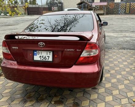 Красный Тойота Камри, объемом двигателя 2.4 л и пробегом 246 тыс. км за 4100 $, фото 14 на Automoto.ua