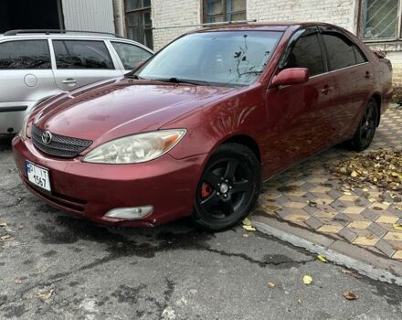 Красный Тойота Камри, объемом двигателя 2.4 л и пробегом 246 тыс. км за 4100 $, фото 6 на Automoto.ua