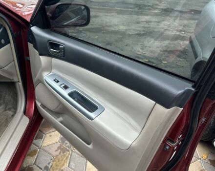 Красный Тойота Камри, объемом двигателя 2.4 л и пробегом 246 тыс. км за 4100 $, фото 18 на Automoto.ua