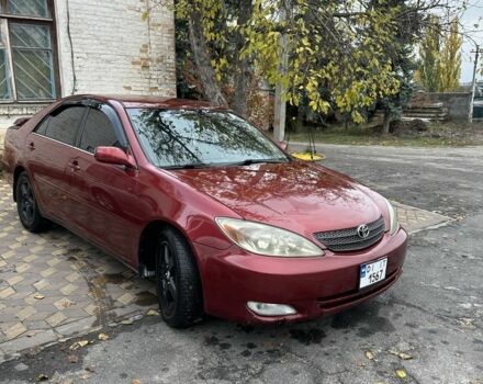 Красный Тойота Камри, объемом двигателя 2.4 л и пробегом 246 тыс. км за 4100 $, фото 4 на Automoto.ua