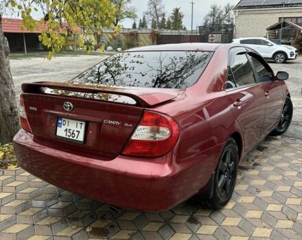 Красный Тойота Камри, объемом двигателя 2.4 л и пробегом 246 тыс. км за 4100 $, фото 11 на Automoto.ua